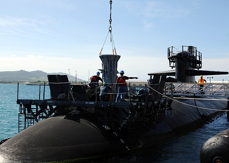 File:US Navy 111123-N-UE250-040 Sailors assigned to the submarine tender USS Frank Cable (AS 40) lower a missile tube extension loader.jpg