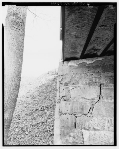 File:VIEW EAST, NORTH END OF EASTERN ABUTMENT, SHOWING 1903 STONEWORK, 1918 CONCRETE FACING AND CAP, AND UNDERSIDE OF 1918 STEEL-AND-CONCRETE DECK - Cyrus Bridge, 195 feet West of HAER WVA,50-CYRUS,1-4.tif