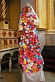 Image of Virgin Mary with paper flowers with children's names