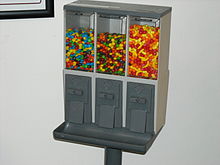 Bulk vending: a bulk candy machine containing M&M's, Skittles, and Runts Vendstar3000.JPG