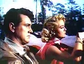 С Дороти Мэлоун в фильме «Слова, написанные на ветру» (1956)