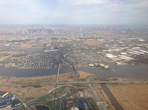 2014-05-07 16 23 15 View of New York City, Secaucus, New Jersey, the Hackensack River, the New Jersey Turnpike Western Spur and New Jersey Route 3 from an airplane heading for Newark Liberty International Airport.JPG
