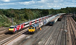 91101 passes 66778 and 66721 by Doncaster Decoy Down Yard.jpg