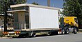 A section of a demountable building on a prime mover 2.jpg