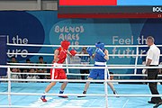 Deutsch: Boxen bei den Olympischen Jugendspielen 2018 Tag 12, 18. Oktober 2018 - Finale Leichtgewicht Mädchen – Oriana Saputo (Argentinien, blau) schlägt Emma Lawson (Australien, rot) 5-0; Ringrichter ist José Romero (Spanien). English: Boxing at the 2018 Summer Youth Olympics on 18 October 2018 – Girls' lightweight Bronze Medal Bout – Oriana Saputo (Argentina, blue) wins over Emma Lawson (Australie, red) 5-0; Referee is José Romero (Spain). Español: Boxeo en los Juegos Olímpicos Juveniles de Verano de 2018 en 18 de octubre de 2018 - Combate de medalla de bronce de las niñas: Oriana Saputo (Argentina, azul) gana a Emma Lawson (Australie, roja) 5-0; Árbitro es José Romero (España).