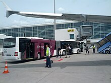 Bus from tarmac to Munich airport terminal (19061210755).jpg