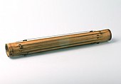 North Sumatra, Indonesia, Toba Batak people, c. 1852. Tanggetong. Also called gondang buluh.[77] "Gondang," Indonesian for Ficus variegata. "Buluh," Indonesian for bamboo. Tube zither with idiochord strings (strings made from the tube itself). Polychord.