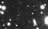 Animation de trois images de Chaldène, la lune irrégulière de Jupiter (S/2000 J 10), prises par David Jewitt à l'aide du télescope Canada-France-Hawaii (CFHT) de 3,6 mètres le 10 décembre 2001. Chaque image a été prise à environ 30 minutes d'intervalle, montrant le mouvement de la lune par rapport aux étoiles et galaxies de fond. La magnitude apparente de Chaldène est de 23,1.