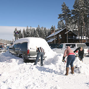 English: Cleaning up after a snow storm in Bor...