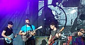 Alternative rock band Coldplay's sixth album, Ghost Stories, gave the band their fourth number-one album to date. It spent two weeks atop the chart. Coldplay Toronto 2011 Muchmusic.jpg