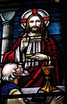 The chalice with the blood of Christ depicted in a stained glass window at St. Matthew's German Evangelical Lutheran Church in South Carolina Communion Closeup.jpg