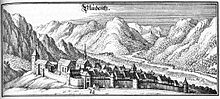 Bludenz um 1643 (Kupferstich von Merian) mit dem Oberen Tor (vorn), der Ill (rechts), dem Montafon (rechts hinten) und dem Klostertal (links hinten).