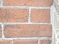 Eroded bricks sw corner of front and frederick, 2013 02 18 -ba.JPG - panoramio.jpg