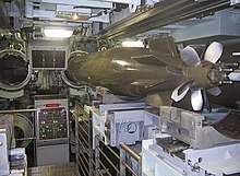 Torpedo tubes of the French SNLE Redoutable: French submarines use pistons to push the torpedo outside the tube, instead of blowing it out with compressed air. FS Redoutable torpilles.jpg