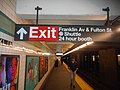 Sign directing commuters to the street and the Franklin Avenue Shuttles.