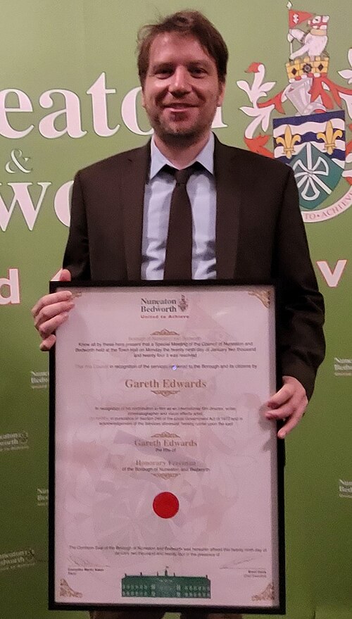 Edwards with his certificate naming him as a Freeman of the Borough for Nuneaton