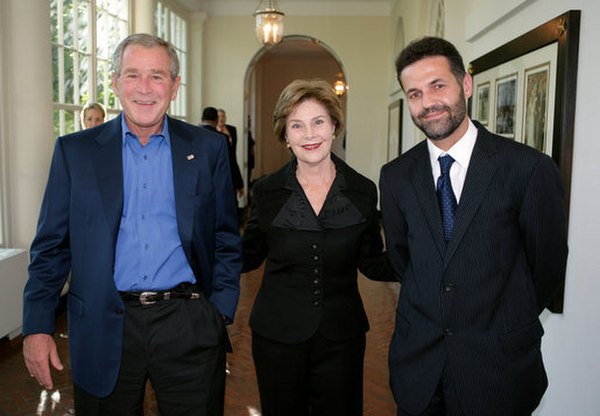 Hosseini with President George W Bush and First lady Laura Bush