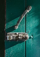 Rank: 23 Handle and door latch on an exterior door