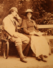 Photograph of parents sitting on garden bench in 1884