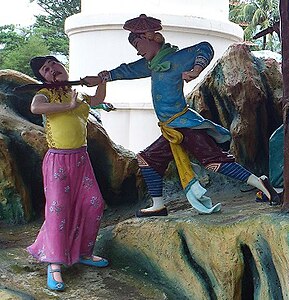 Diorama a Haw Par Villa (Singapur) que representa Wu Song matant a Pan Jinlian (esquerra)