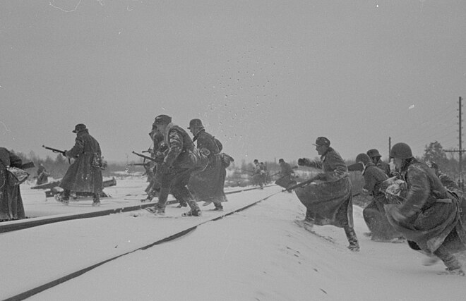 Finnish soldiers crossing the Murmansk railway in 1941