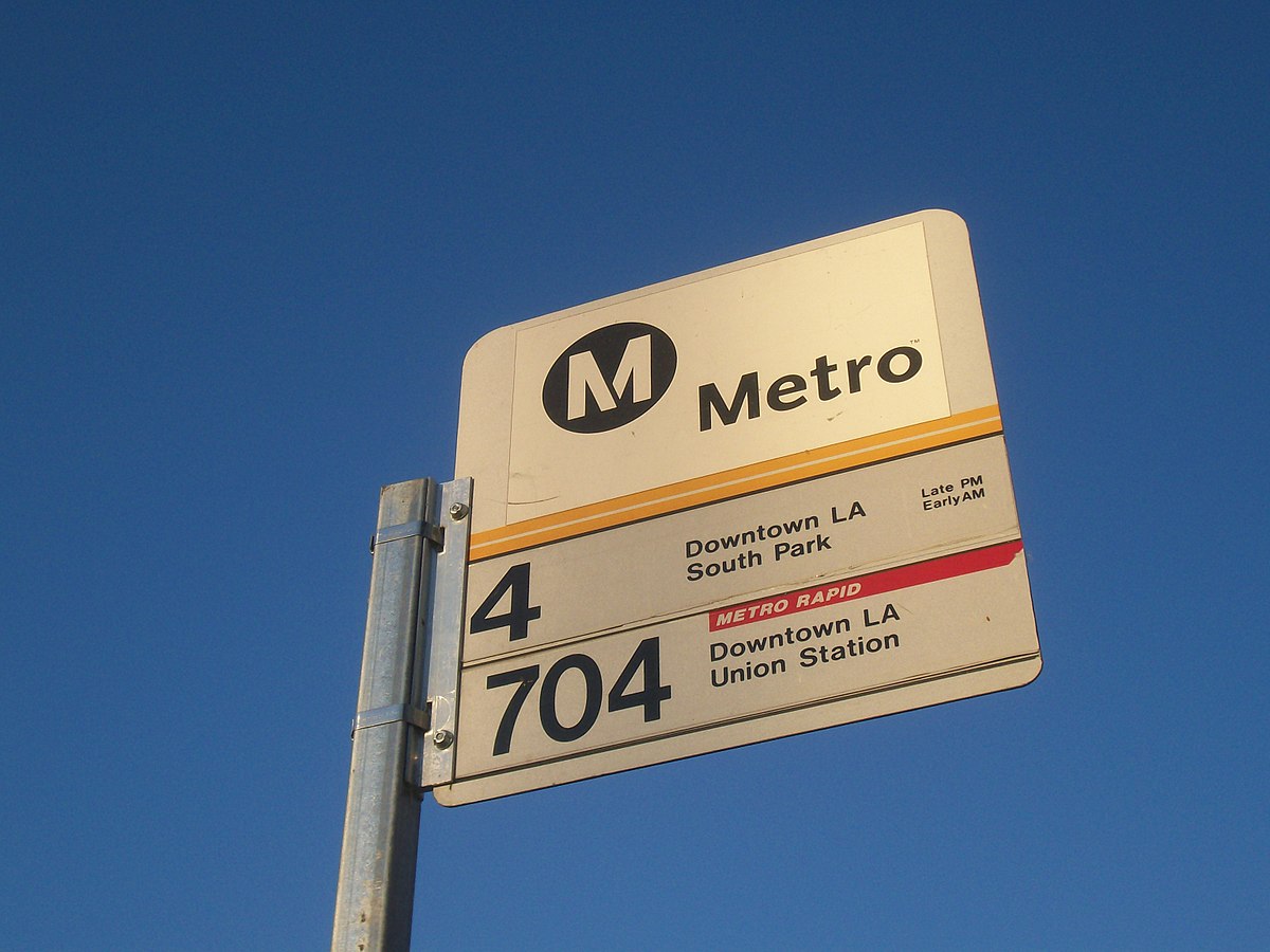 Down metro. King County Metro Bus stop sign.