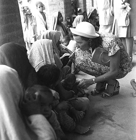 Lady Edwina Mountbatten visiting a refugee camp just outside Delhi in June 1947.
