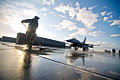 Master Sgt. Chris Skierski sweeps the flightline for foreign objects and debris at Bagram in 2012