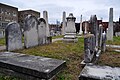 The cemetery is filled with a pack of tombstones.