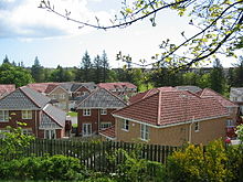 Modern housing at Woodend, Aberdeen, built in brick, half timbering can be seen in the distance Modern Housing, Woodend - geograph.org.uk - 11445.jpg