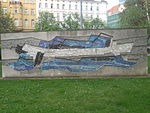 is free.  Concrete relief wall with mosaic "The Flight", "The Airport"