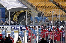 Penguins and Capitals alumni squads salute the crowd after the game. NHL Legends Game saluting the crowd 2010-12-31.JPG