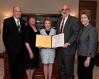 Arnold, second from right, poses with former First Lady Nancy Reagan after awarding her an honorary degree from Eureka College, March 31, 2009. Nancy Reagan honorary degree 2009.jpg