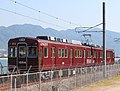 An ex-Nose Electric Railway 1500 series converted to a "MIHARA-Liner" test train at Mitsubishi Heavy Industries's test track at Mihara