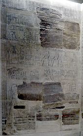 Fragments of reliefs interspersed with recent drawing showing the likely continuation of the damaged parts
