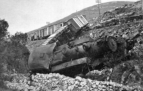 Palestine Railway K class 2-8-4T steam locomotive and freight train derailed from the Jaffa and Jerusalem line after being sabotaged by Jewish insurge