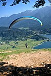 Paraglider @ Lake Bohinj (29320289685).jpg