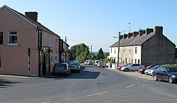 The R464 road through the village