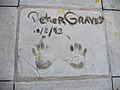 Thumbnail for File:Peter Graves (handprints in cement).jpg