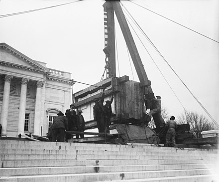 Placing the marble sarcophagus on top of the Tomb (1931)