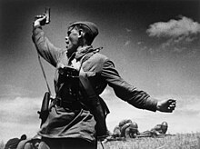 Iconic photo of a Soviet officer (thought to be Ukrainian Alexei Yeryomenko) leading his soldiers into battle against the invading German army, 12 July 1942, in Soviet Ukraine RIAN archive 543 A battalion commander.jpg