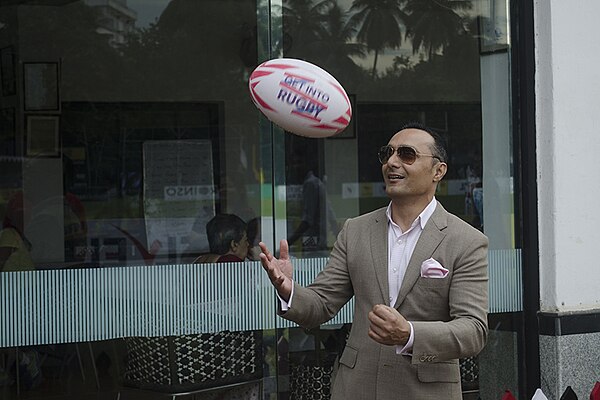 Rahul Bose juggles a rugby ball at the All India & South Asia Rugby Tournament