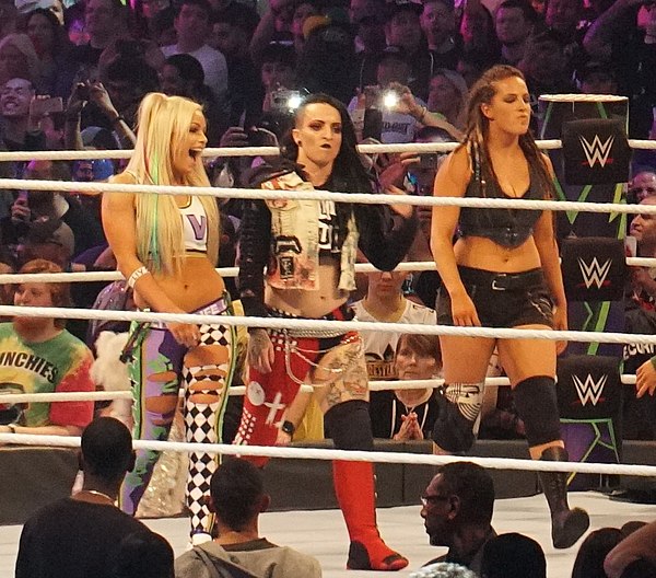 Morgan (left) along with fellow members of The Riott Squad Ruby Riott (center) and Sarah Logan (right) at WrestleMania 34