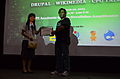 Jojit receives a certificate of appreciation from Milcah Sarah Dumaguing, ITSA President.