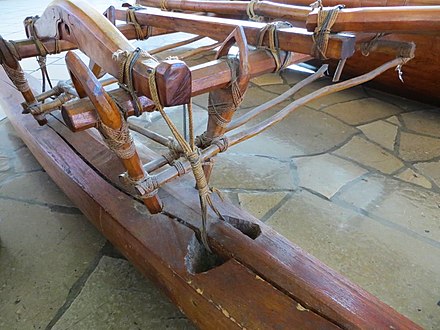 An outrigger canoe from Sonsorol, Palau. All parts of the canoe are connected by thin coir ropes.