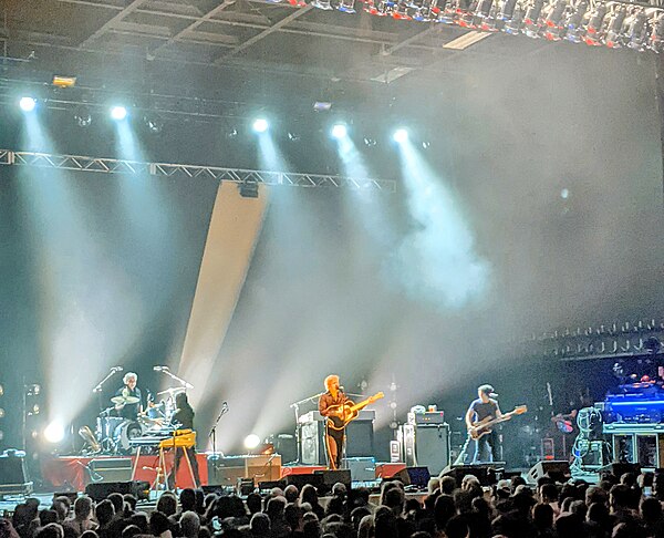 Spoon performing in Pittsburgh, Pennsylvania, in 2022, as part of their tour of Lucifer on the Sofa album