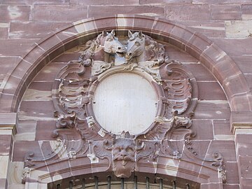 Rococo cartouche with two horse mascarons and a Green Man at the bottom, on the facade of the Palais Rohan, Strasbourg, France, 1732-1742