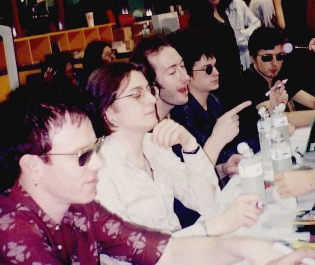 Suede in Thailand, 1997. Left from right: Simon Gilbert, Richard Oakes, Mat Osman, Neil Codling and Brett Anderson.