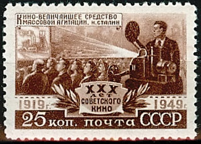 1950 postage stamp, marking 30 years of Soviet film. It quotes Stalin, who calls cinema "the greatest medium of mass agitation."