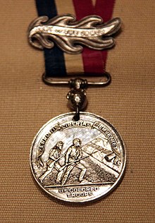 U.S. Colored Troops Medal issued by General Benjamin Butler. US Colored Troops medal - 1865 - Smithsonian Museum of American History - 2012-05-15.jpg